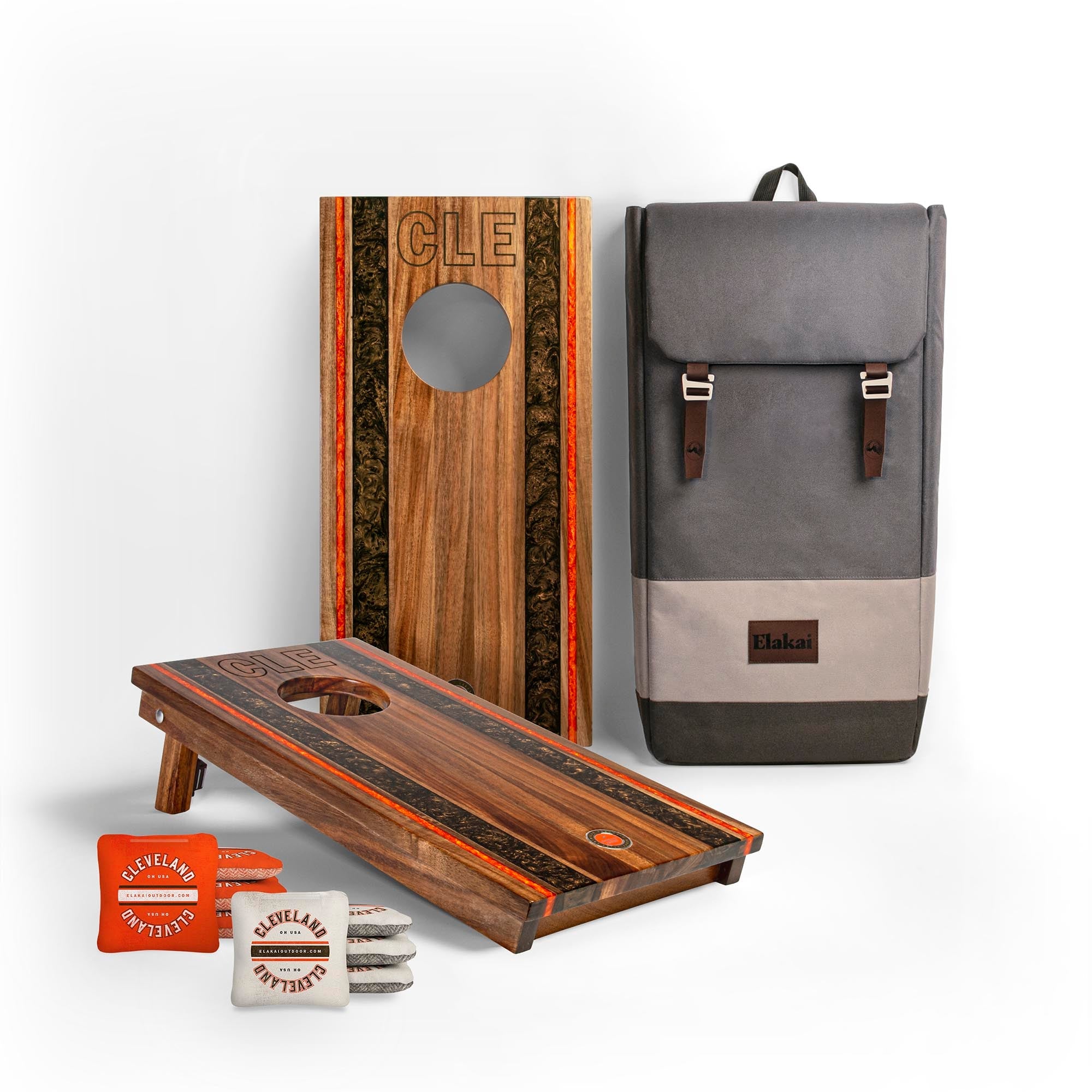 1x2 Gameday Resin Travel Cornhole Board Set with resin brown and orange stripes, a gray backpack and two sets of Cleveland cornhole bags
#color_cleveland