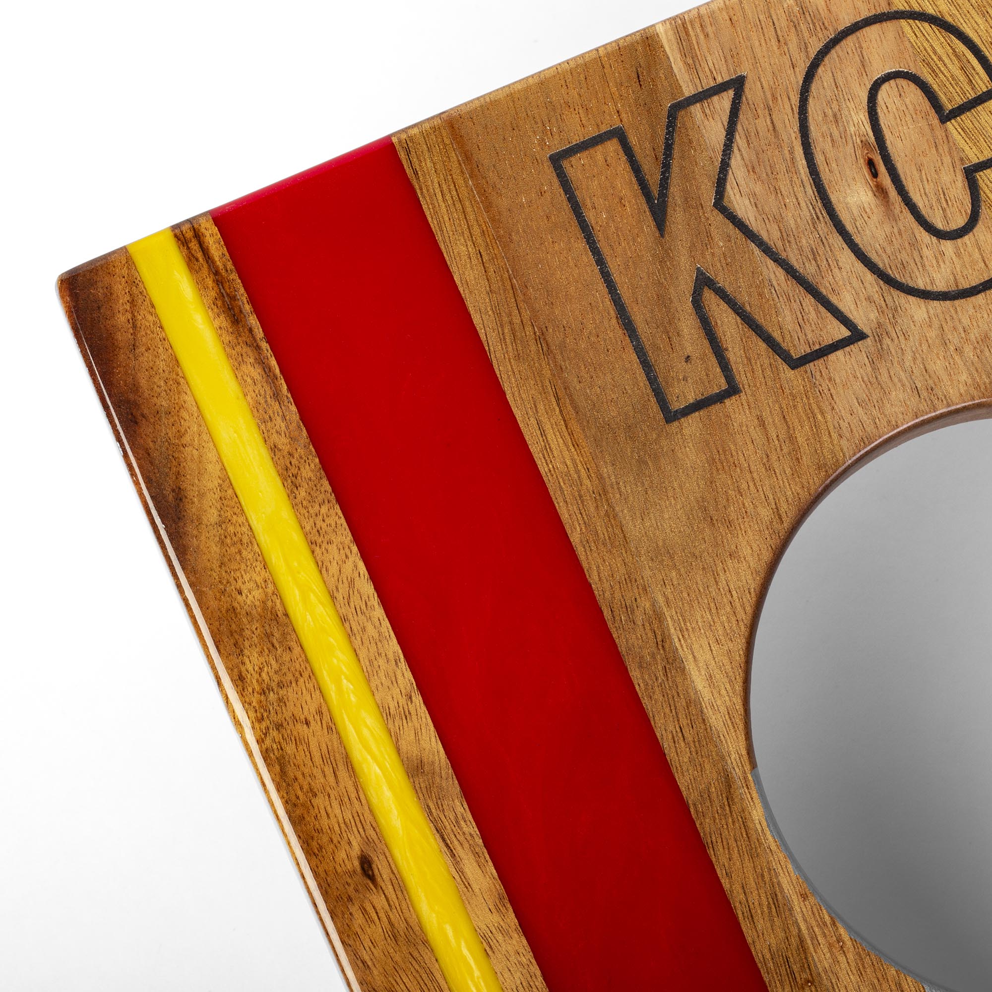 resin and 'KC' engraving detail on a wooden 1x2 travel cornhole board
#color_kansas city