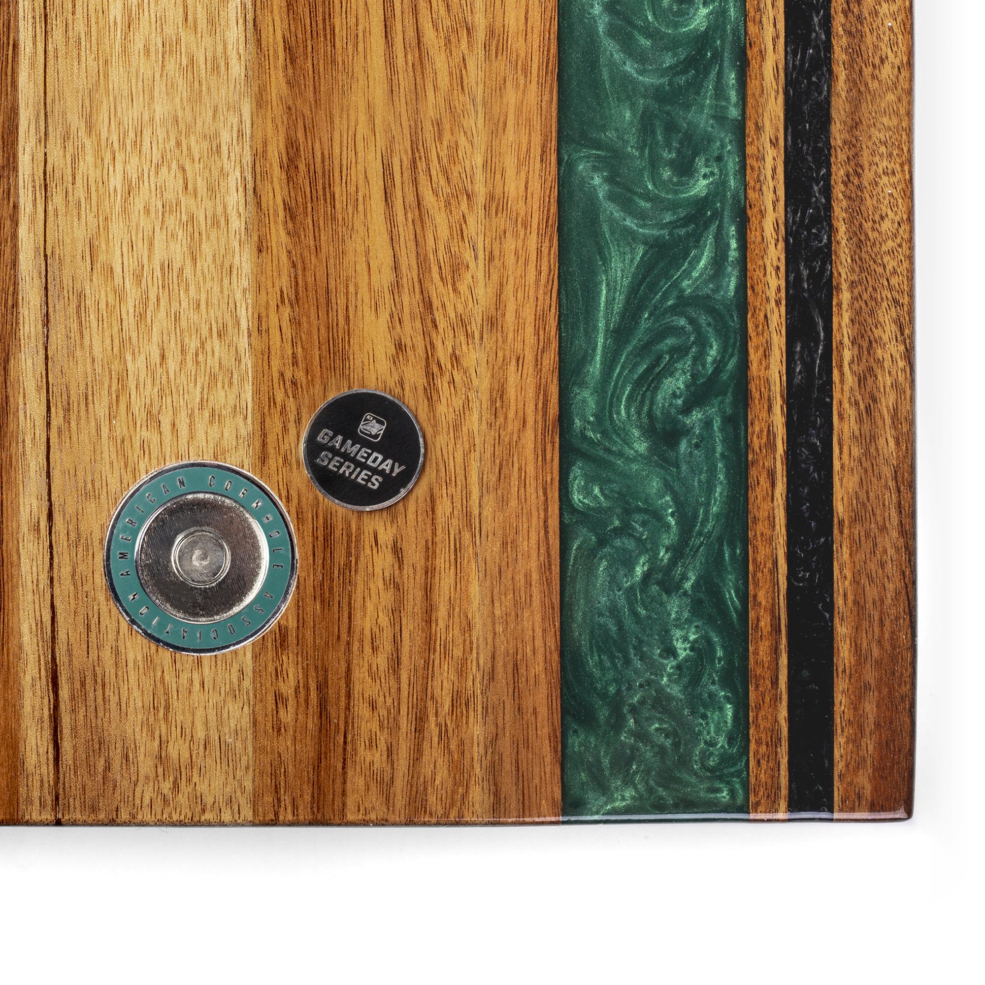 close-up detail of resin inlay and gameday coin insert on travel cornhole board
#color_philadelphia