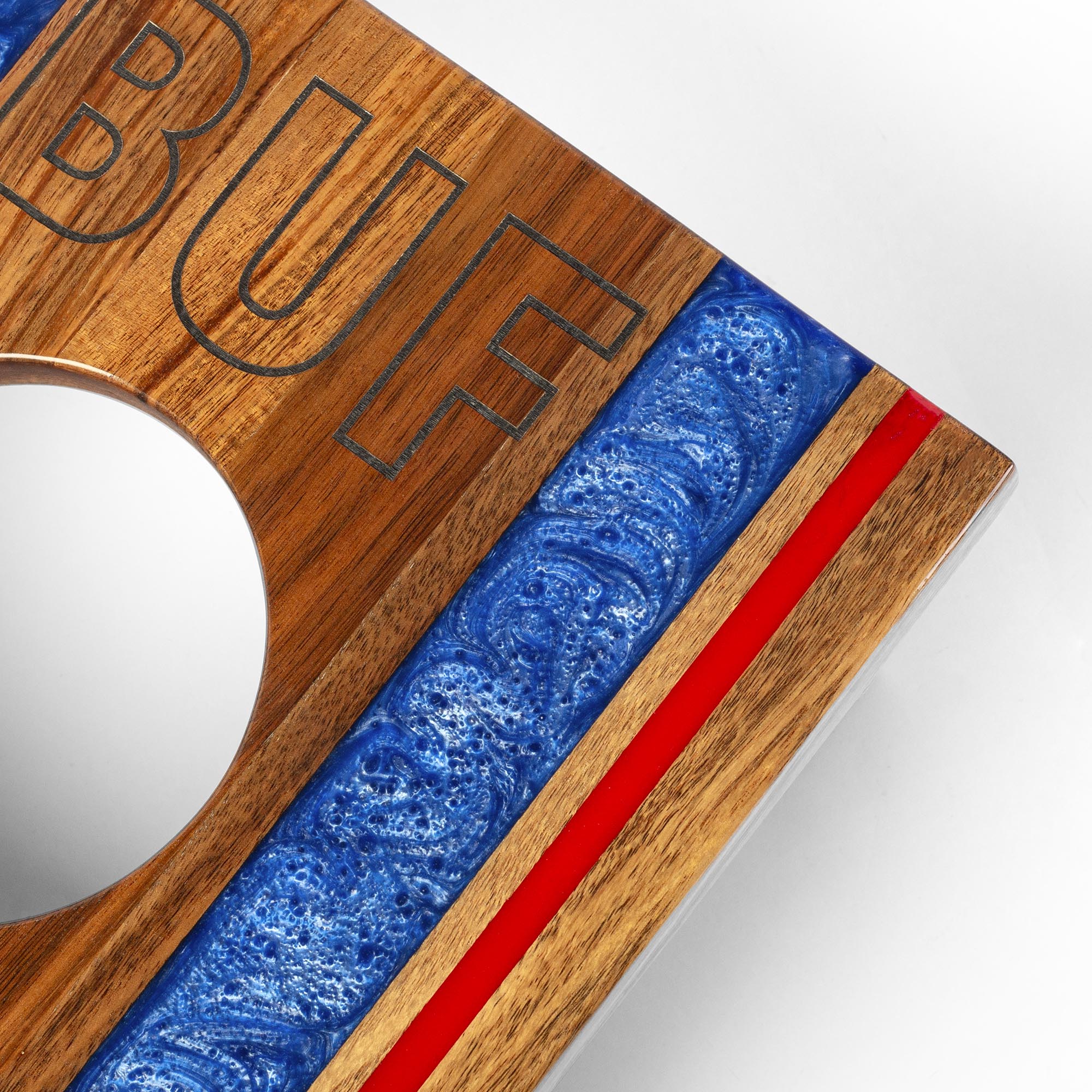 resin and 'BUF' engraving detail on a wooden 1x2 travel cornhole board
#color_buffalo