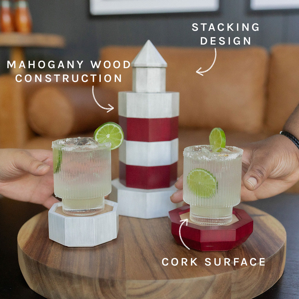 Mahogany wood lighthouse coaster set with cork surface styled with drinks for coastal entertaining