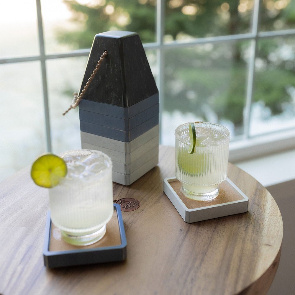 Buoy stacking coaster set styled with drinks on a table for coastal entertaining