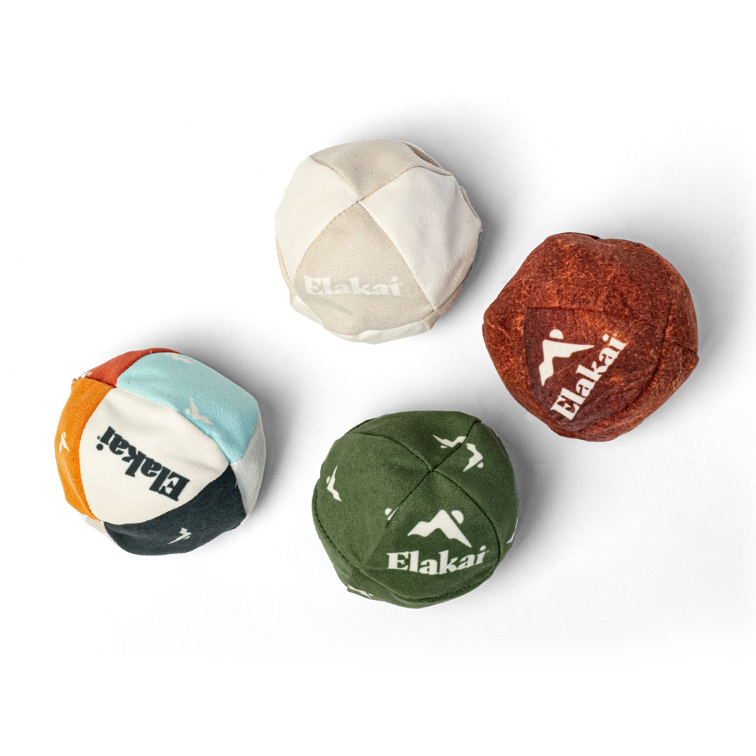 Four colorful kippahs with 'Elakai' branding on a white background
