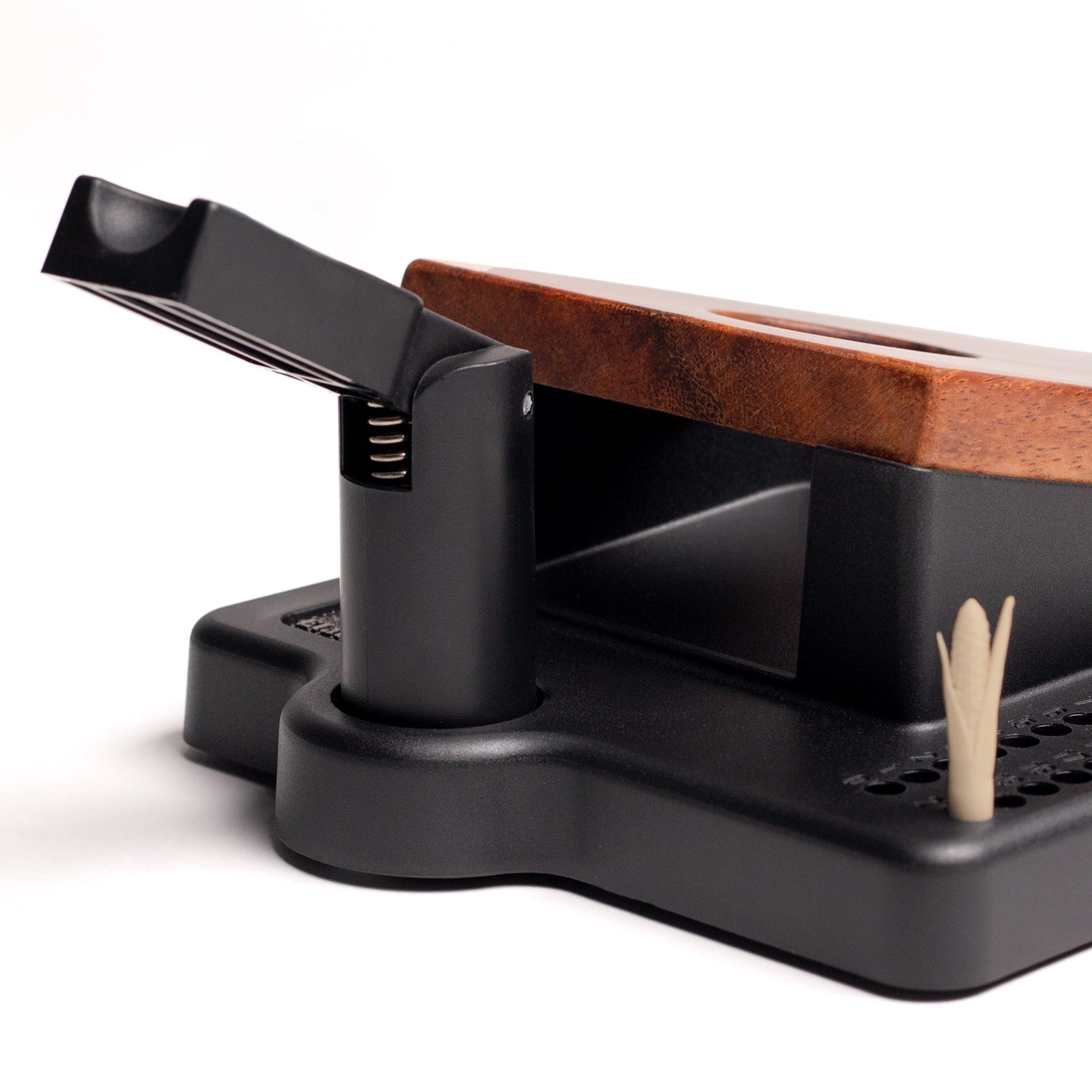 Side detail of the Elakai Gameday tabletop mini double chuck cornhole game showing spring-loaded launch flipper, mini cornhole bags, and wood resin board construction