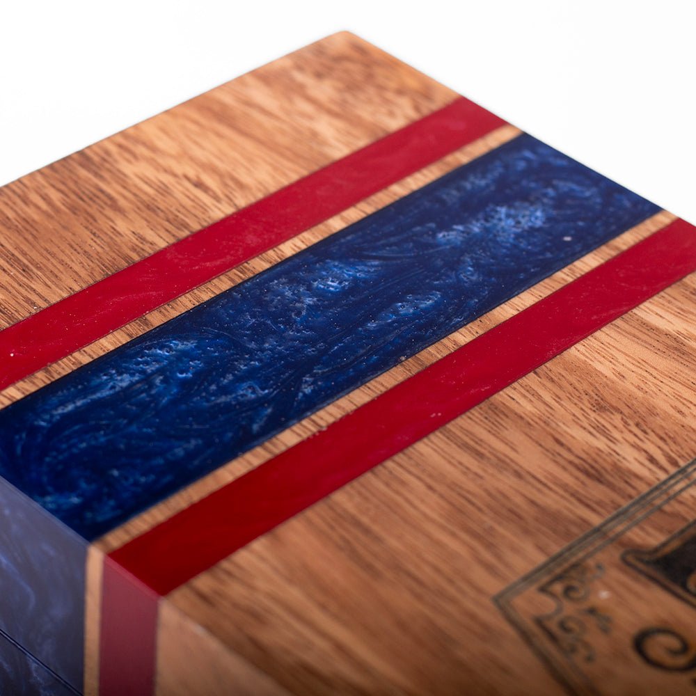 Elakai cedar-lined acacia hardwood cigar box with handcrafted resin accent and hinged lid for decorative cigar storage.
#color_buffalo