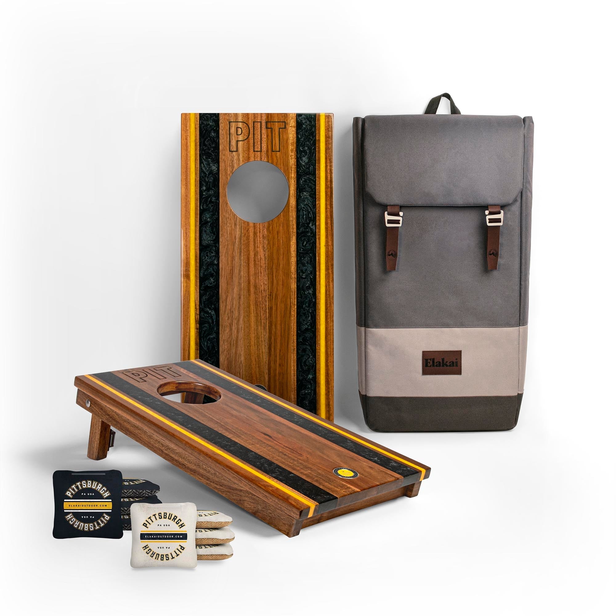 1x2 Gameday Resin Travel Cornhole Board Set with resin black and yellow stripes, a gray backpack and two sets of Pittsburgh cornhole bags
#color_pittsburgh