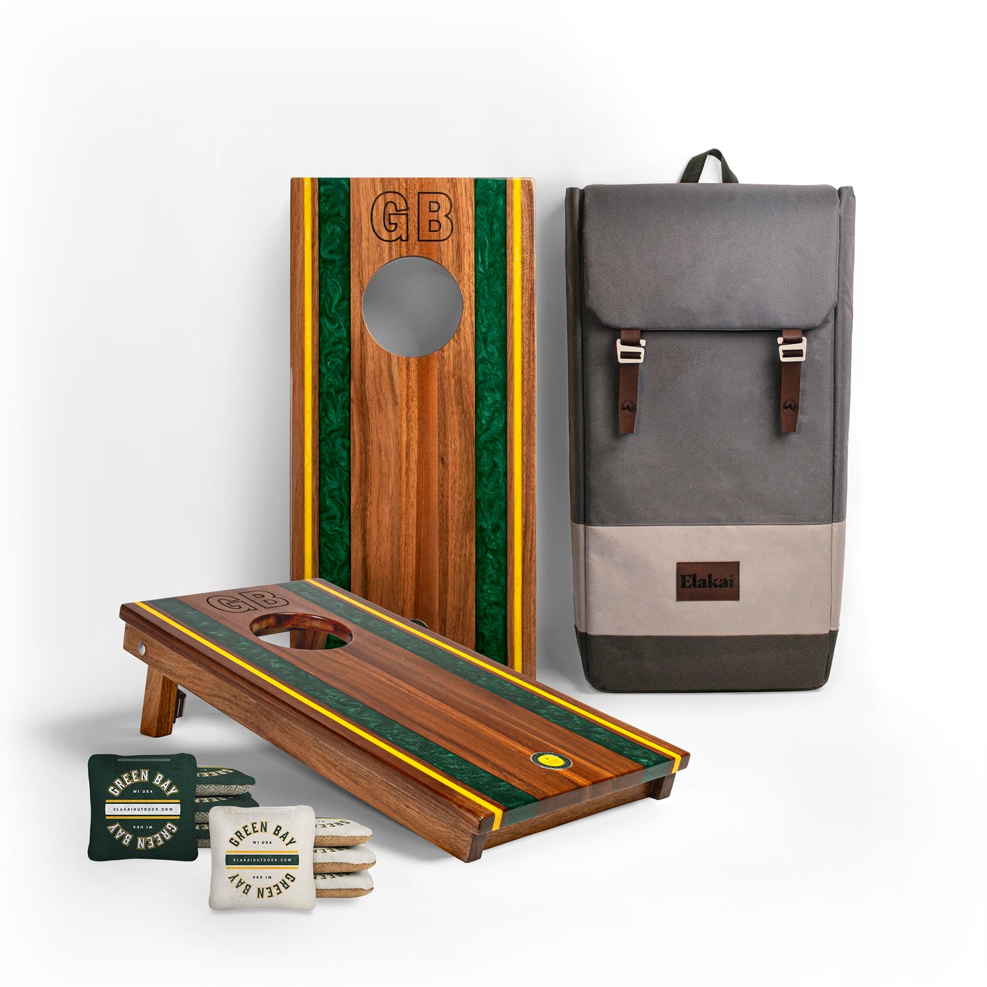 1x2 Gameday Resin Travel Cornhole Board Set with resin green and yellow stripes, a gray backpack and two sets of Green Bay cornhole bags
#color_green bay