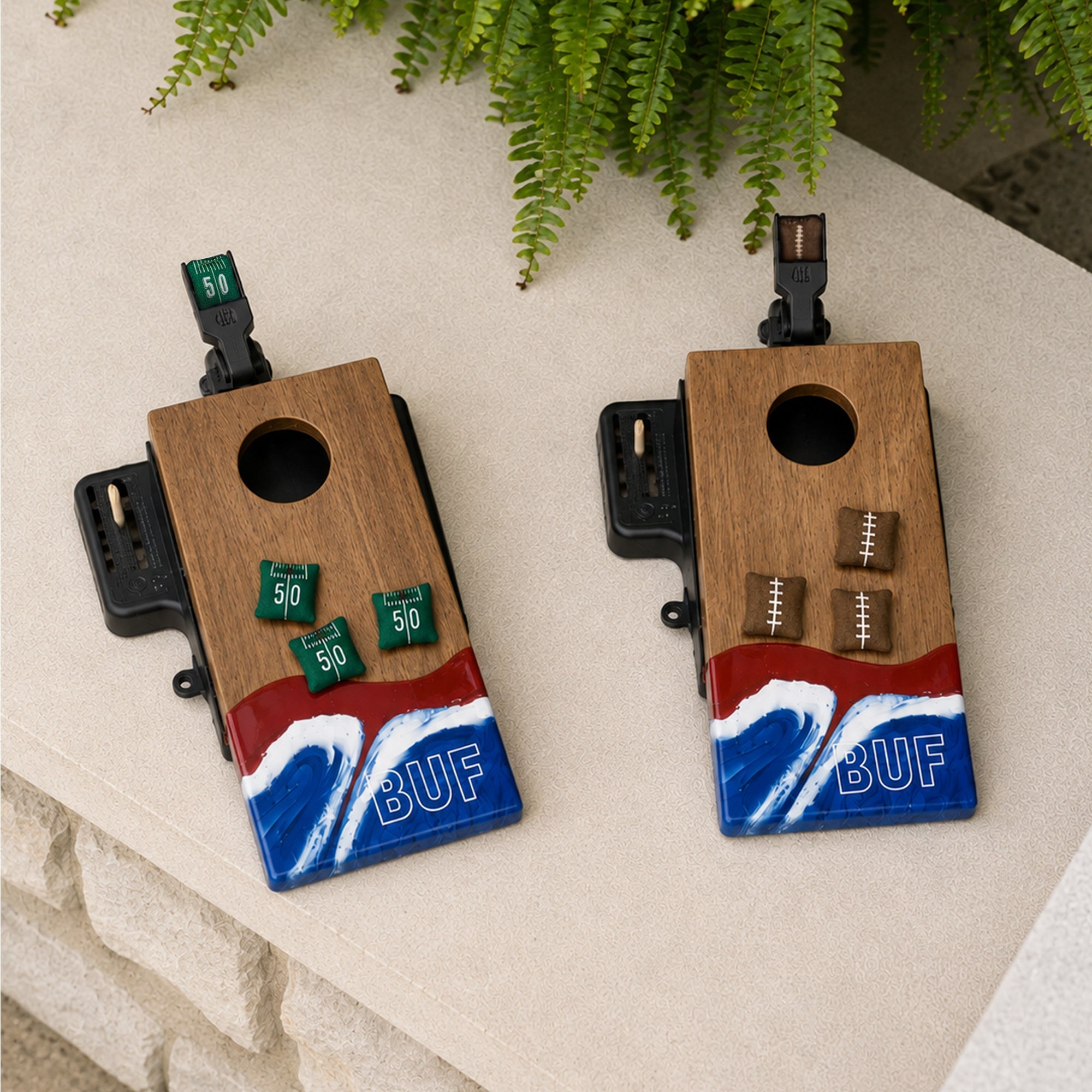 Two wooden cornhole boards featuring a red, white, and blue wave design at the bottom with 'BUF' lettering.

#color_buffalo