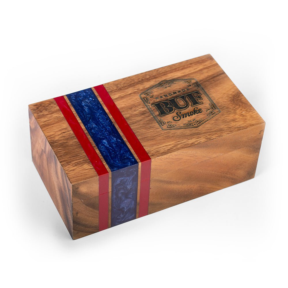 Elakai premium cedar-lined cigar box handcrafted from acacia hardwood with blue and red resin inlay for luxury cigar storage.

#color_buffalo