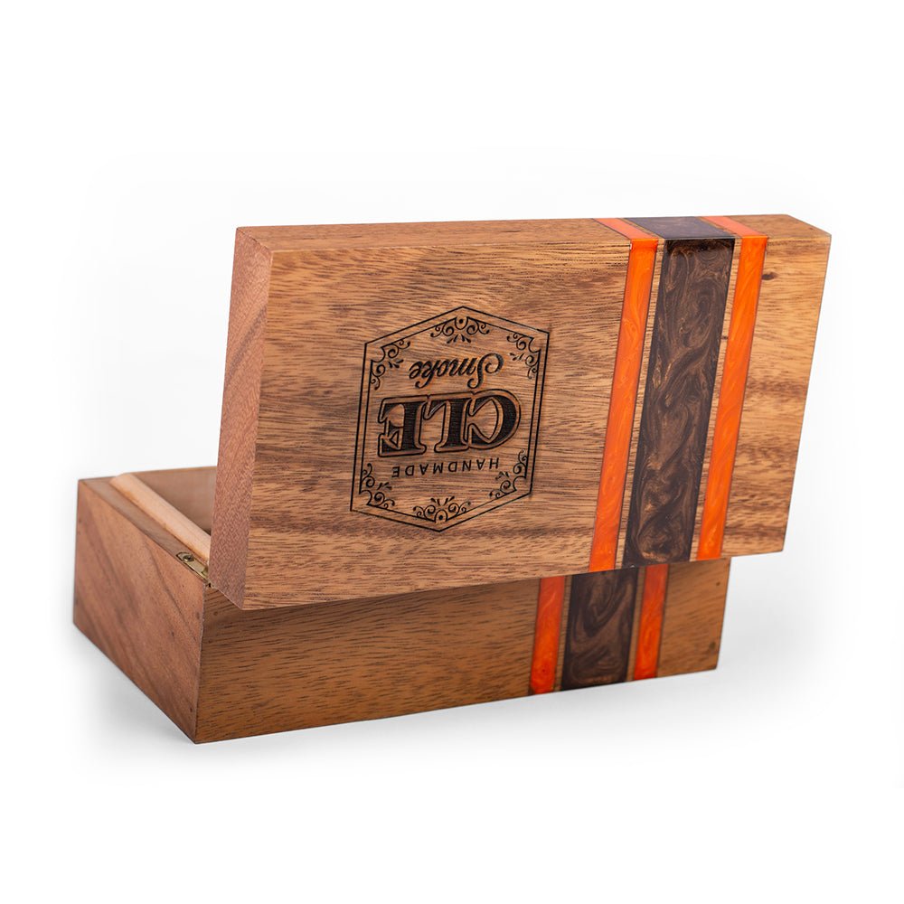 Handcrafted acacia hardwood cigar box with cedar-lined interior and hinged lid for premium cigar storage and organization by Elakai.

#color_cleveland