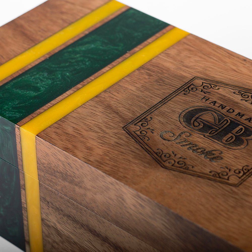Elakai cedar-lined acacia hardwood cigar box with handcrafted resin accent and hinged lid for decorative cigar storage.

#color_green bay