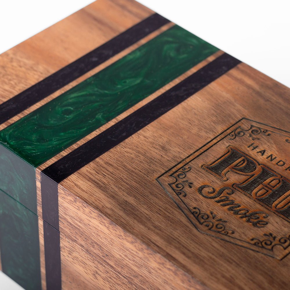 Elakai cedar-lined acacia hardwood cigar box with handcrafted resin accent and hinged lid for decorative cigar storage.

#color_philadelphia