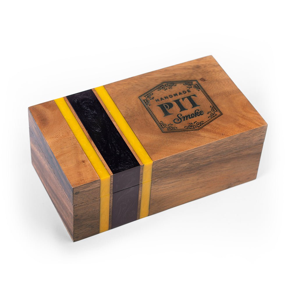 Elakai premium cedar-lined cigar box handcrafted from acacia hardwood with yellow and black resin inlay for luxury cigar storage.

#color_pittsburgh