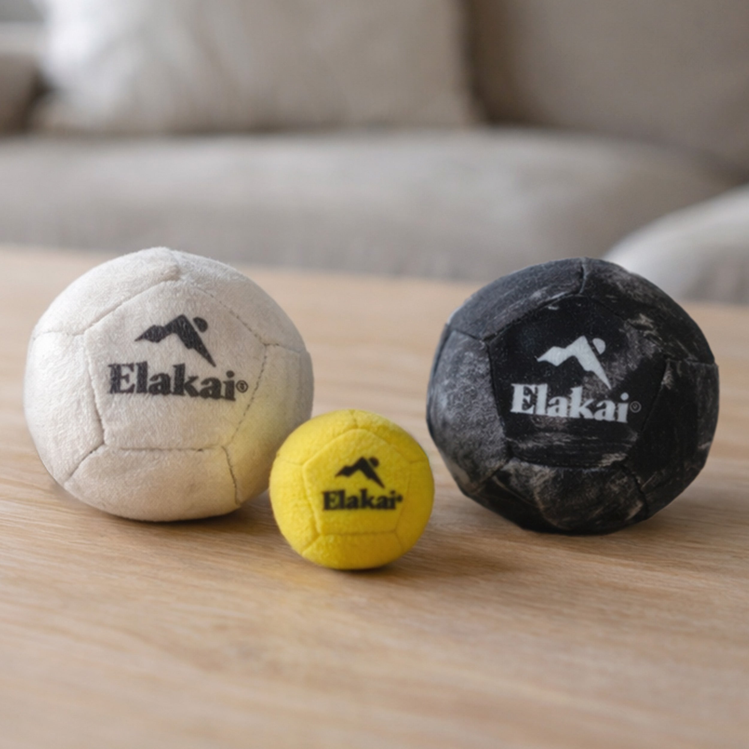 Elakai Soft Bocce balls arranged indoors on a wood surface for casual indoor play