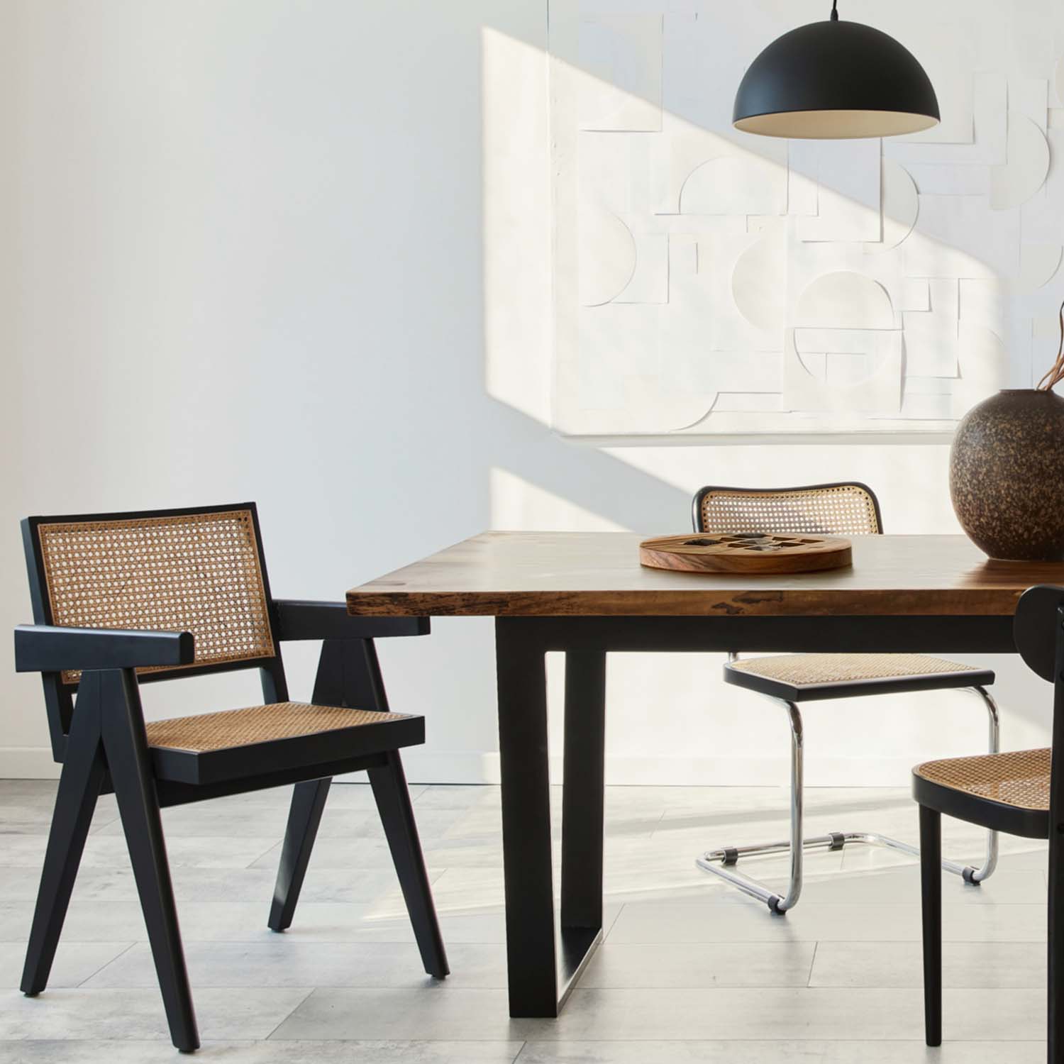 Acacia wood tic tac toe board styled on a modern dining table as decorative wooden board game home decor