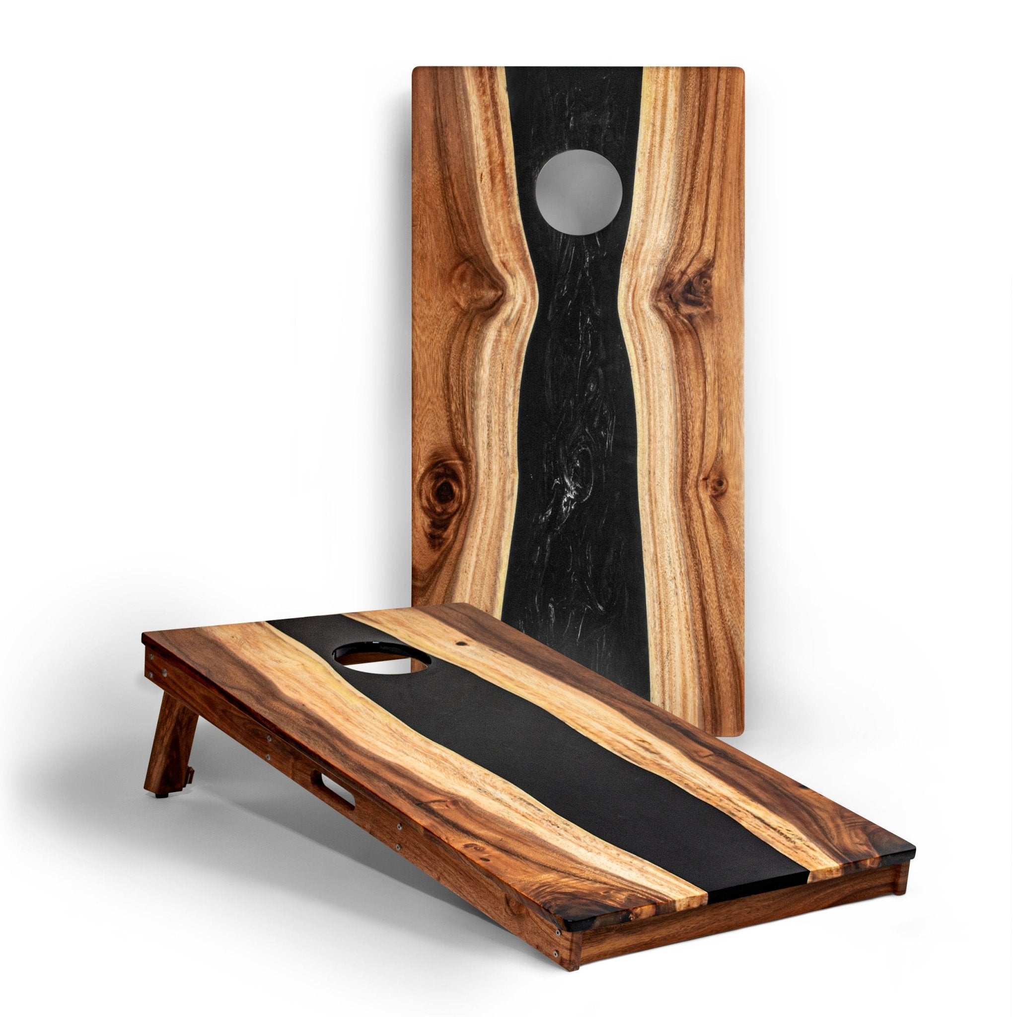 Handcrafted cornhole boards in Black Pearl with bag and target hole #color_black