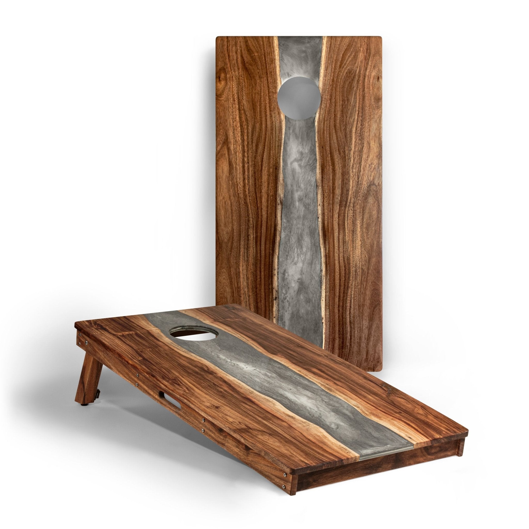 A pair of cornhole boards with a rich wood grain design featuring a central metallic silver river running down the middle, shown on a clean white background. #color_gray stone