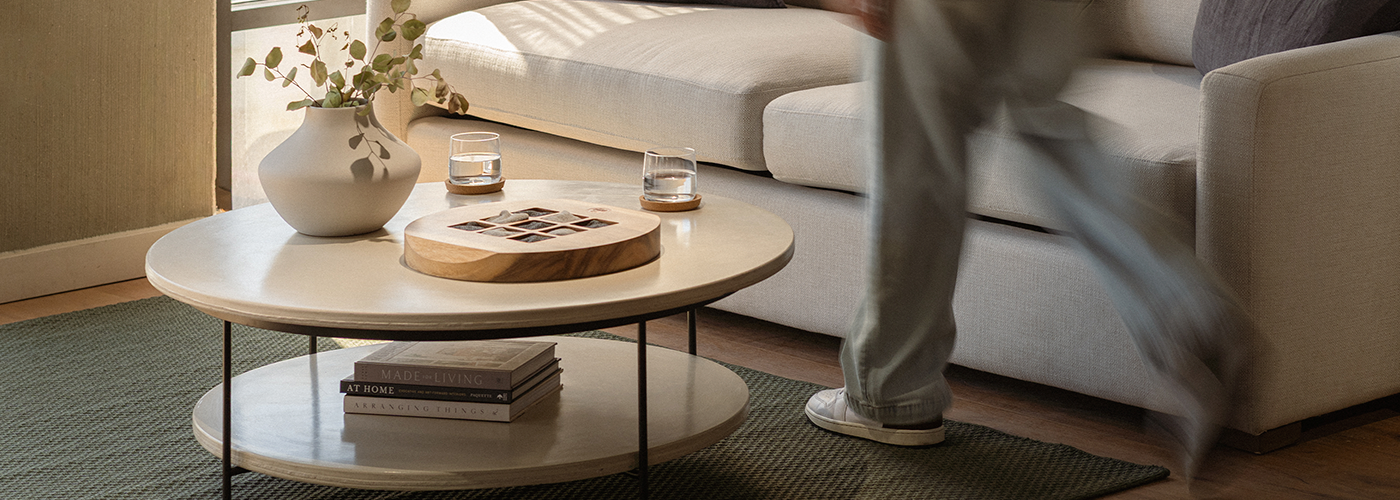 Studio Series Tic Tac Toe displayed on a modern coffee table in a contemporary living room.